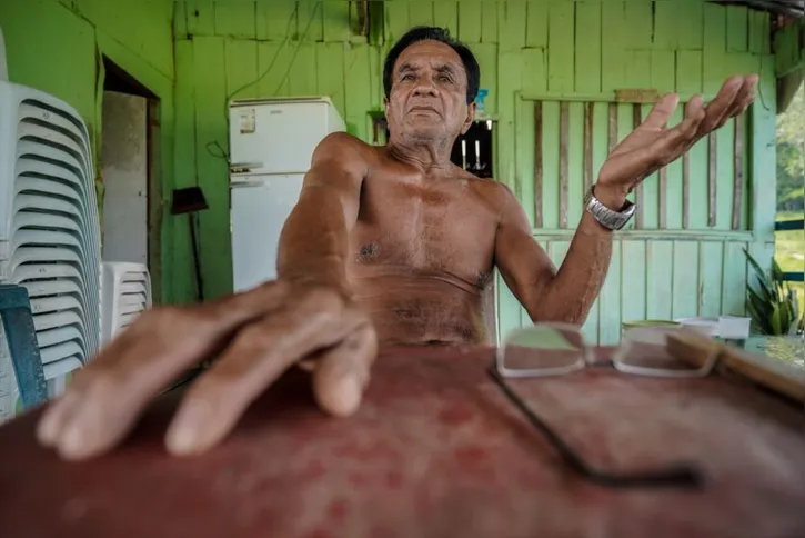 Imagem ilustrativa da imagem Rio Negro sobe lentamente e pescadores esperam retomar rotina
