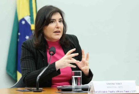 Imagem descritiva da notícia Tebet critica taxa de juros a 13,75% ao ano